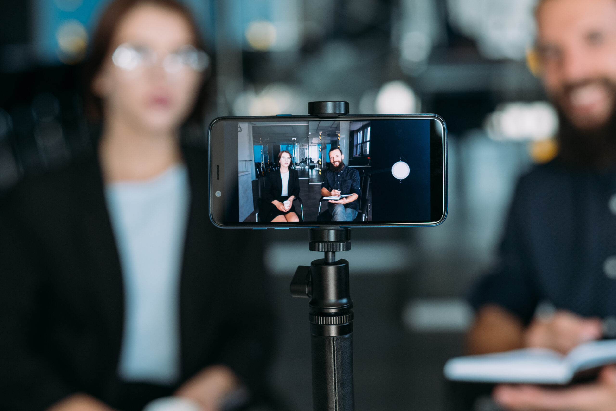 business man woman video phone coaching workshop